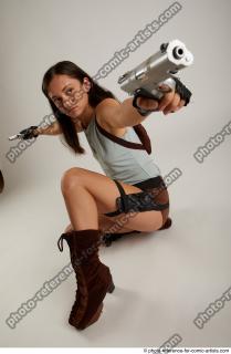 05 Shrima Kneeling Pose With Guns